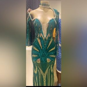 Emerald green, one shoulder, sequin dress with an attached choker.